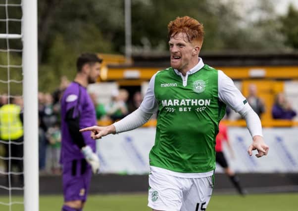 Simon Murray celebrates after heading home his second goal to seal Hibs' win over Alloa in the Betfred Cup. Picture: SNS