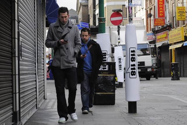 Honolulu has banned texting while crossing the road to prevent injuries. Picture: Micha Theiner/Getty Images