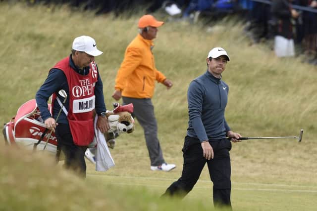Rory McIlroy and JP Fitzgerald walk down the fairway in the recent Open Championship at Royal Birkdale. Picture: Ian Rutherford