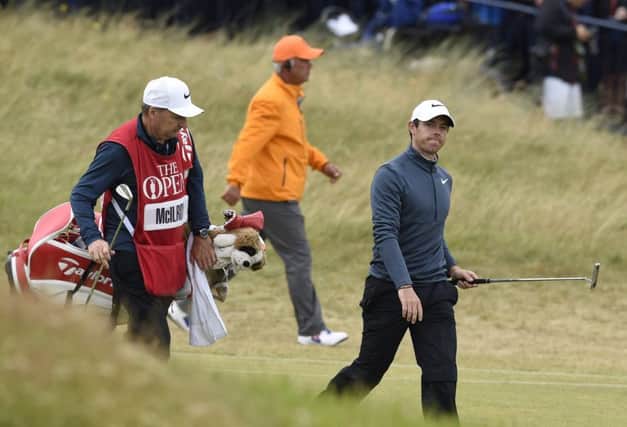 Rory McIlroy and JP Fitzgerald walk down the fairway in the recent Open Championship at Royal Birkdale. Picture: Ian Rutherford