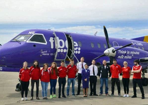Orcadian footballers and hockey players get ready to board plane. Picture: Supplied