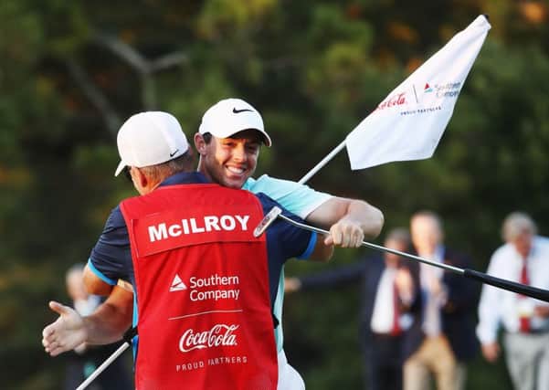 Picture: Rory McIlroy celebrates with JP Fitzgerald after winning the Tour Championship on the PGA Tour last September. Picture: Sam Greenwood/Getty