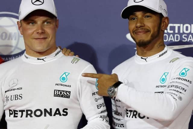 Lewis Hamilton, right,  gave up third place to Mercedes team-mate Valtteri Bottas at the Hungarian Grand Prix.