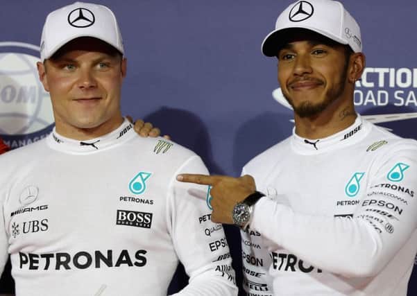 Lewis Hamilton, right,  gave up third place to Mercedes team-mate Valtteri Bottas at the Hungarian Grand Prix.