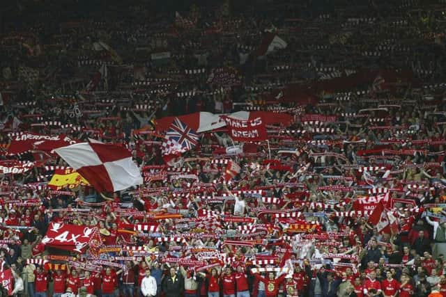 85 per cent of fans old enough to have stood on the Kop terracing want a standing section. Picture: Getty.