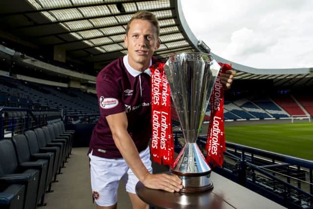 Christophe Berra with the Ladbrokes Premiership trophy. Picture: SNS