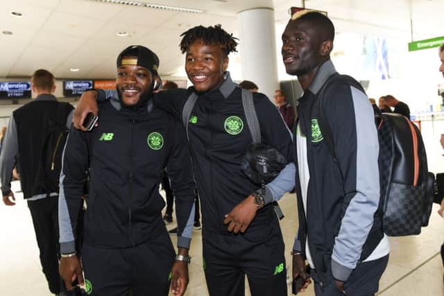 Celtic's Olivier Ntcham, Kundai Benyu and Kouassi Eboue ahead of the flight to Norway. Picture: Craig Williamson/SNS