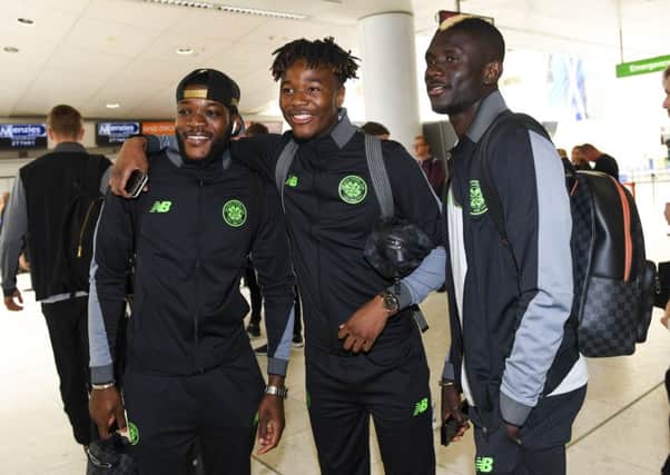 Celtic's Olivier Ntcham, Kundai Benyu and Kouassi Eboue ahead of the flight to Norway. Picture: Craig Williamson/SNS