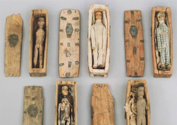 Some of the miniature coffins found on Arthur's Seat in 1836. PIC: National Museum of Scotland.