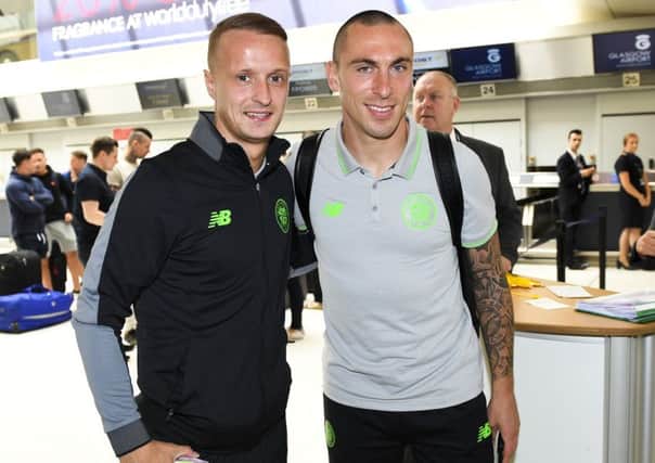 Celtic's Leigh Griffiths (left) hit back at taunt at Glasgow Airport. Picture: SNS/Craig Williamson