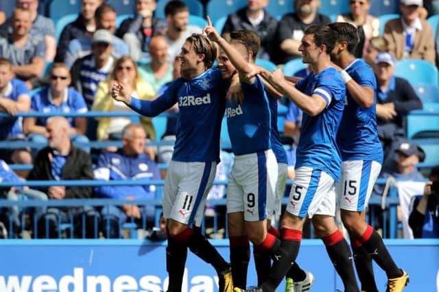Josh Windass, left, celebrates his goal at Hillsborough. Picture: PA.