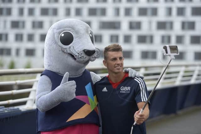Bonnie takes a 'sealfie' with Olympic gold medalist gymnast Max Whitlock after being unveiled as the new mascot of the 2018 European Championships in Glasgow. Picture: SWNS