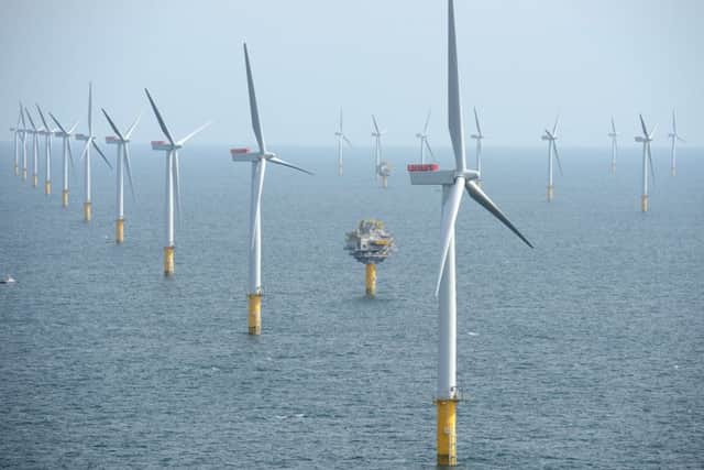 Wind turbines. By using 100 per cent wind, water and solar energy, 24 million jobs could be created. Picture: TSPL