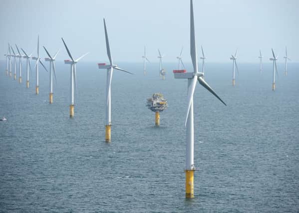 Wind turbines. By using 100 per cent wind, water and solar energy, 24 million jobs could be created. Picture: TSPL
