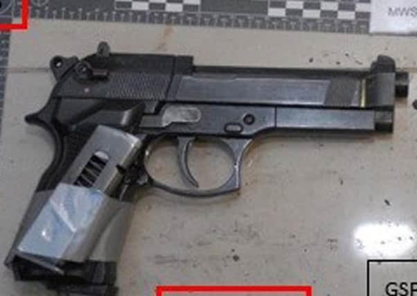 An imitation handgun with an empty magazine strapped to it that was found stashed in Naweed Ali's Seat Leon car, as members of a terrorist cell who dubbed themselves the "Three Musketeers. Picture: West Midlands Police