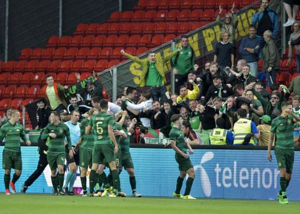 Celtic players celebrate James Forrest's goal against Rosenborg. Picture: Ole Martin Wold/NTB scanpix via AP