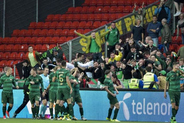 Celtic players celebrate James Forrest's goal against Rosenborg. Picture: Ole Martin Wold/NTB scanpix via AP