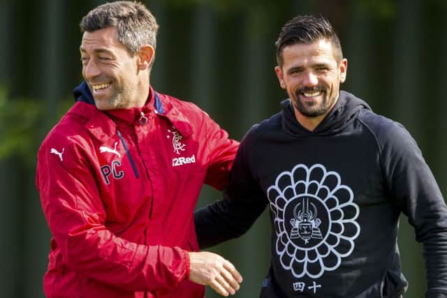 Pedro Caixinha, left, with ex-Rangers striker Nacho Novo. Picture: SNS