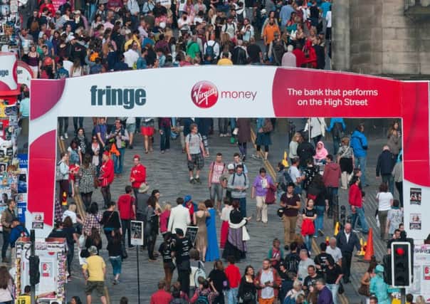 Edinburgh Festival Fringe madness on the Royal Mile. Picture: Alex Hewitt