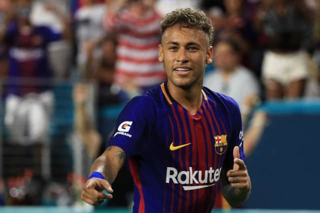 reports suggest Neymar will earn £540,000 per week after tax following his move to Paris St Germain. Picture: Getty.