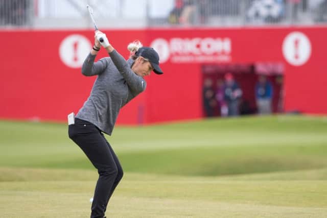 Mel Reid hits her approach to the 18th en route to a five-under 67 in the first round of the Ricoh Women's British Open at Kingsbarns. Picture: Kenny Smith/PA
