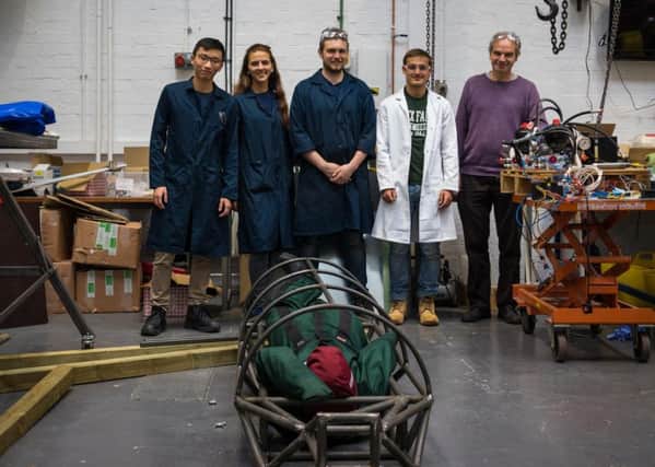 Members of the University of Edinburgh Hyperloop Team in their workshop.