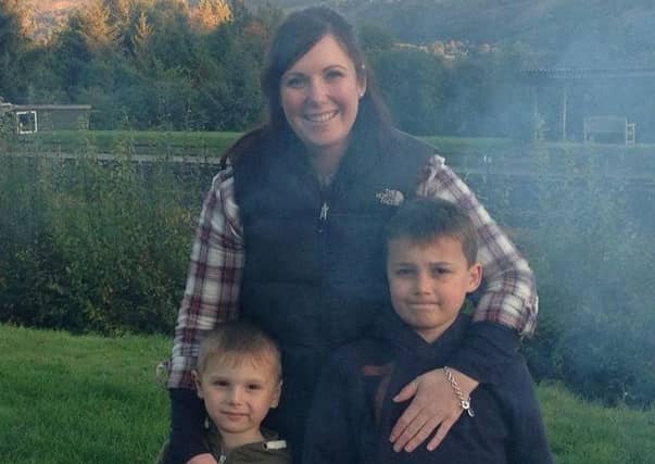 Finlay with mum Jen and brother Frasier
. Finlay Bennett was killed in July 2014 by the disease, aged eight.