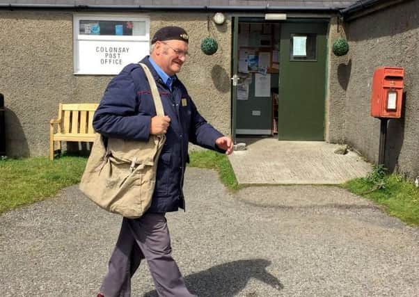 Keith Rutherford, delivering the mail on the isle of Colonsay, has clocked up 100,000 miles on his postal
delivery rounds - on an island with only 12 miles of road.