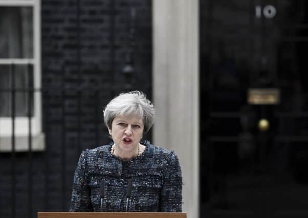 Prime Minister Theresa May makes a statement in Downing Street announcing the General Election. Picture; Getty