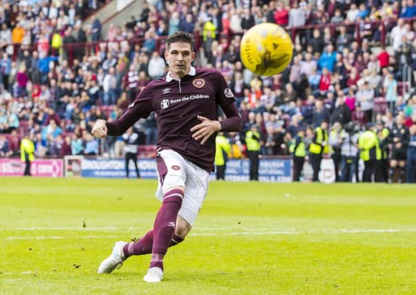 Kyle Lafferty can expect a hot reception at Celtic Park. Picture: Roddy Scott/SNS