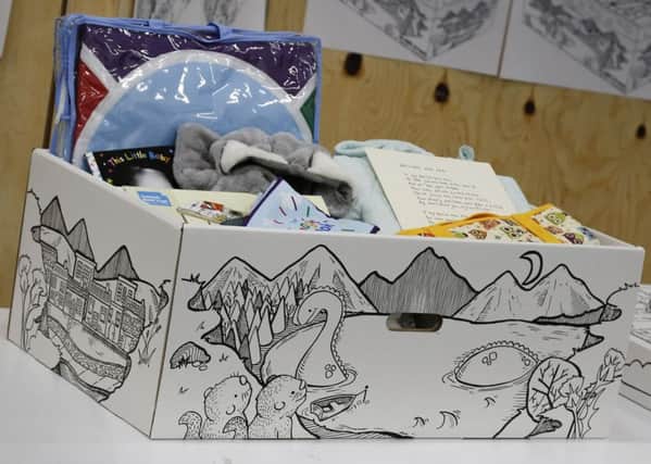 Above left: the Scottish baby box, featuring a winning design by Edinburgh Napier University student Leanne Young. Picture: Scottish Government