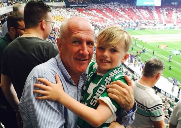 Chic Charnley with his son Raphael at Hampden watching his beloved Celtic.
