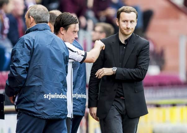 Hearts' decision to sack head coach Ian Cathro left Brendan Rodgers disappointed. Picture: Roddy Scott/SNS