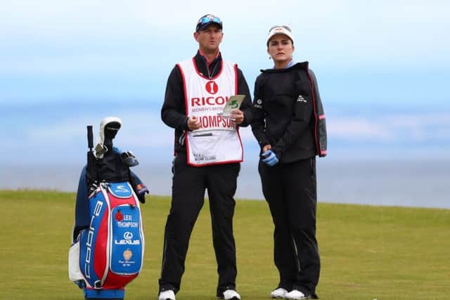 Lexi Thompson looks on with her caddie, Kevin McAlpine, during the second round of the Ricoh Women's British Open at Kingsbarns. Picture: Matthew Lewis/Getty Images