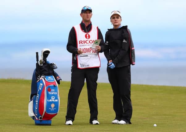 Lexi Thompson looks on with her caddie, Kevin McAlpine, during the second round of the Ricoh Women's British Open at Kingsbarns. Picture: Matthew Lewis/Getty Images