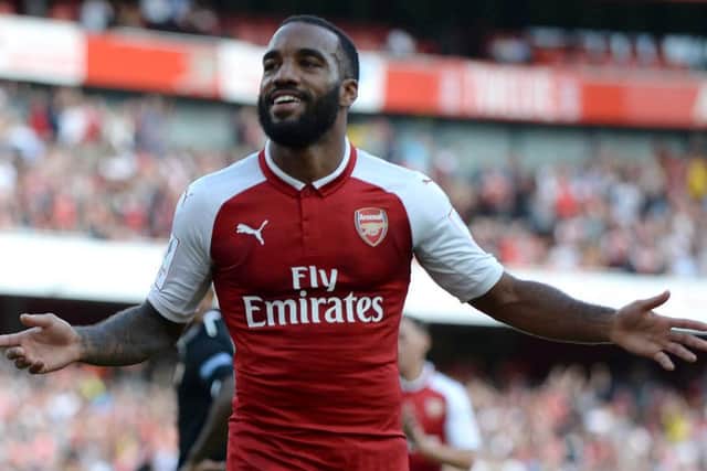 Arsenal's French striker Alexandre Lacazette celebrates scoring the team's first goal during the pre-season friendly against Sevilla. Picture: Getty