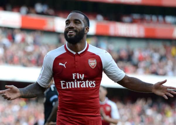 Arsenal's French striker Alexandre Lacazette celebrates scoring the team's first goal during the pre-season friendly against Sevilla. Picture: Getty