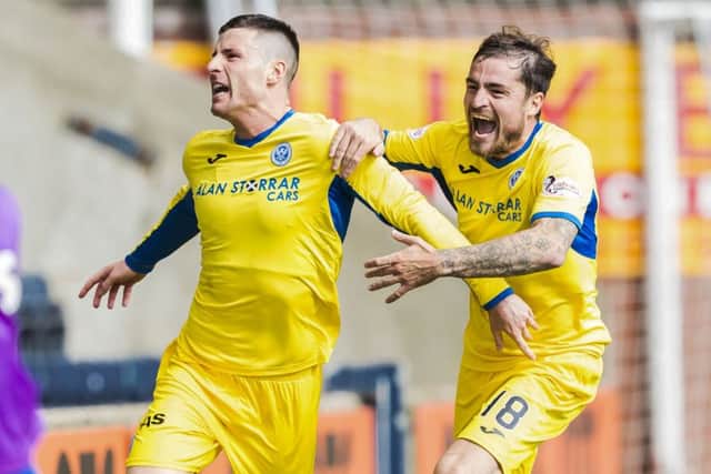 St Johnstone's Michael O'Halloran celebrates his late winner with Paul Paton. Picture: Roddy Scott/SNS