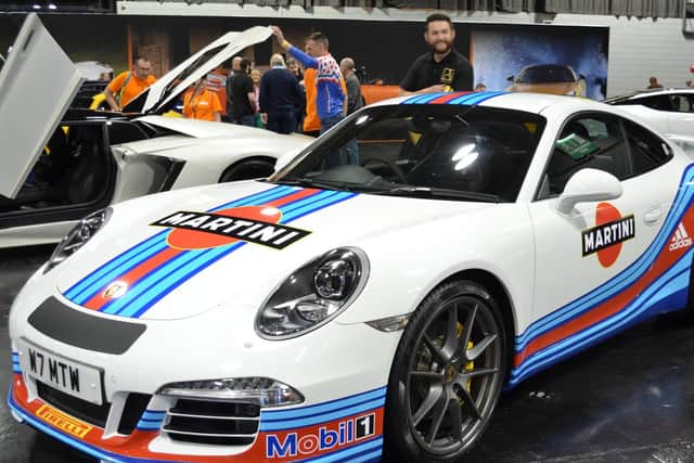 A Porsche 911 in Martini racing livery. Picture: Keven Stewart