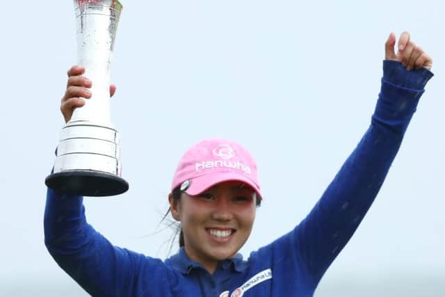 In-Kyung Kim poses with the trophy following her victory at the British Women's Open at Kingsbarns. Picture: Matthew Lewis/Getty Images