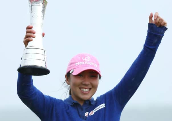In-Kyung Kim poses with the trophy following her victory at the British Women's Open at Kingsbarns. Picture: Matthew Lewis/Getty Images