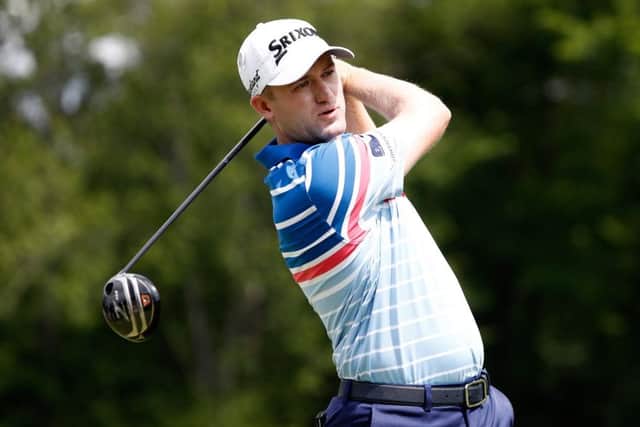 AKRON, OH - AUGUST 06: Russell Knox of Scotland hits off the sixth tee during the final round of the World Golf Championships - Bridgestone Invitational at Firestone Country Club South Course on August 6, 2017 in Akron, Ohio. (Photo by Sam Greenwood/Getty Images)