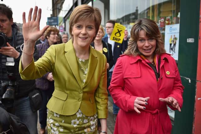 Nicola Sturgeon, left, with Michelle Thomson on the campaign trail in April 2015. Picture: Getty Images