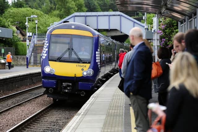 Commuters await a train to Glasgow at Falkirk High station. ScotRail has been urged to launch an awareness campaign to inform passengers of their rights. Picture: Michael Gillen