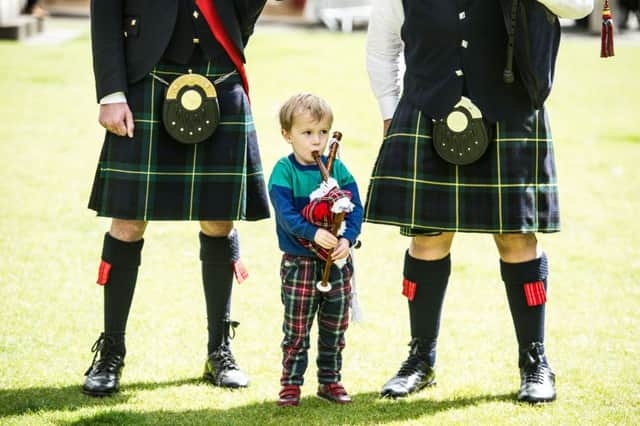 Three-year-old Ruairidh Nicoll from Ayrshire gets into the spirit of Piping Live! Picture: John Devlin/TSPL