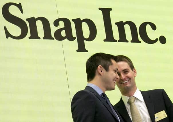 Snapchat co-founders Bobby Murphy, left, and Evan Spiegel. Picture: Richard Drew/AP
