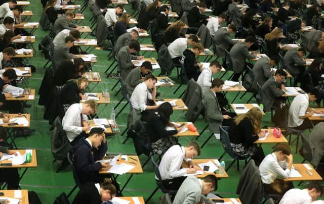 Students will spend less time being tested under the new plans, said John Swinney. Picture: PA