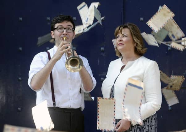 Second World War love letters flutter as trumpeter Tom Poulson plays The Last Post at the launch of the Made in Scotland showcase with Culture Secretary Fiona Hyslop.
Picture: Neil Hanna