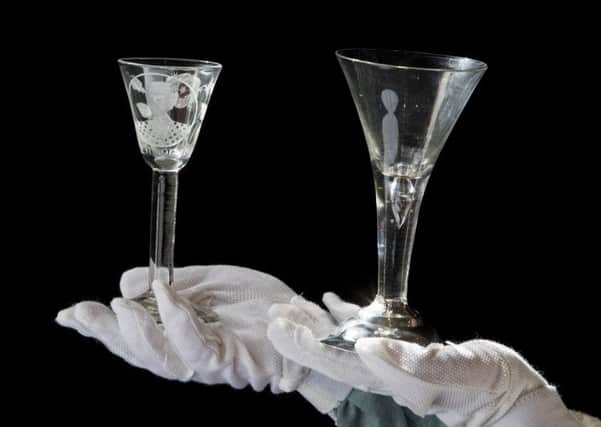 The rare Jacobite drinking glass, pictured right. Picture: SWNS