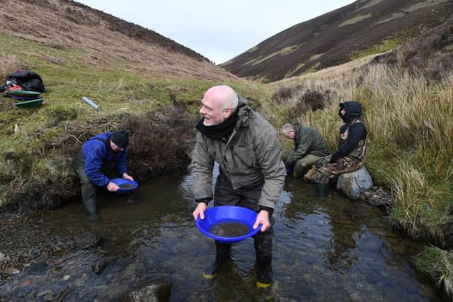 Gold panning in Scotland. Picture: SWNS
